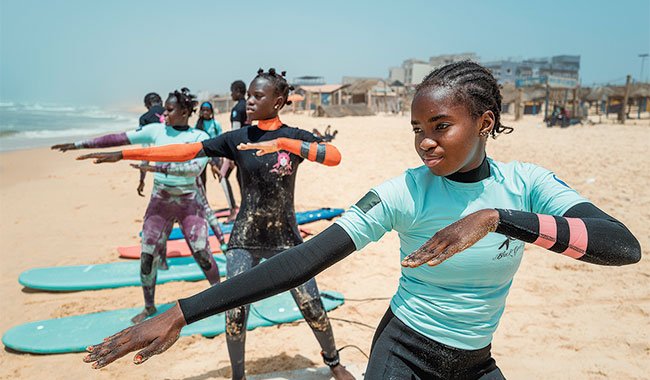 Surfing in Senegal: empowering girls through waves and education