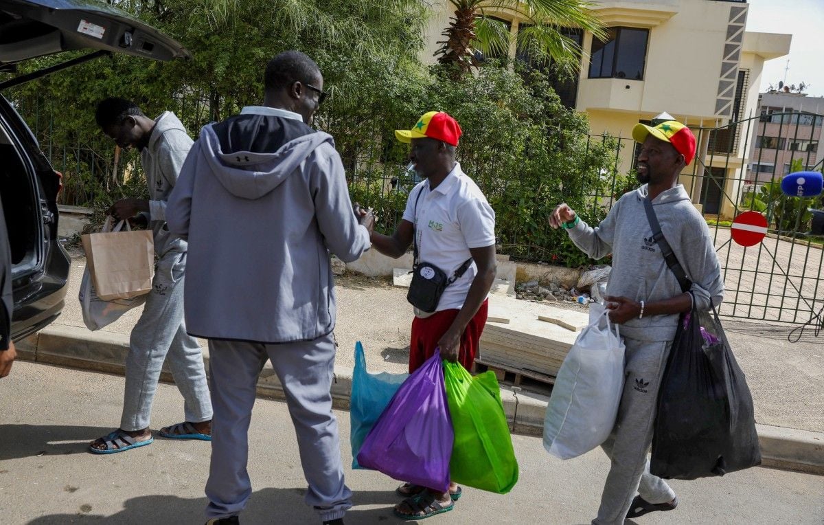 Sénégal fans return from Morocco after can detention