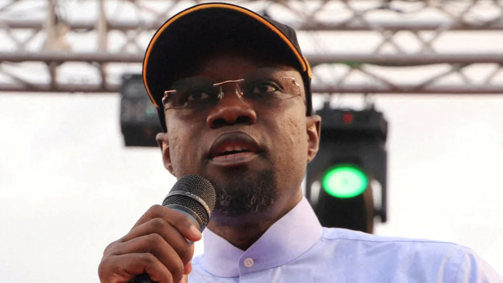Ousmane Sonko speaking at a press conference in Dakar