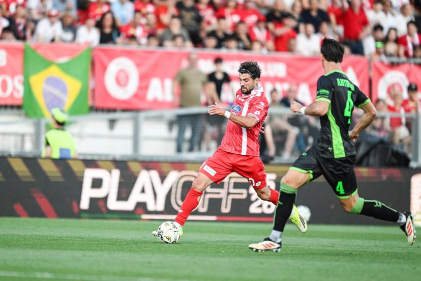 Patrick Cutrone celebrates Monza's Serie A promotion despite a tense playoff finale against Catanzaro