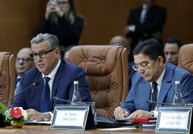 moroccan prime minister aziz akhannouch (l) and foreign minister nasser bourita during a plenary session with the french delegation
