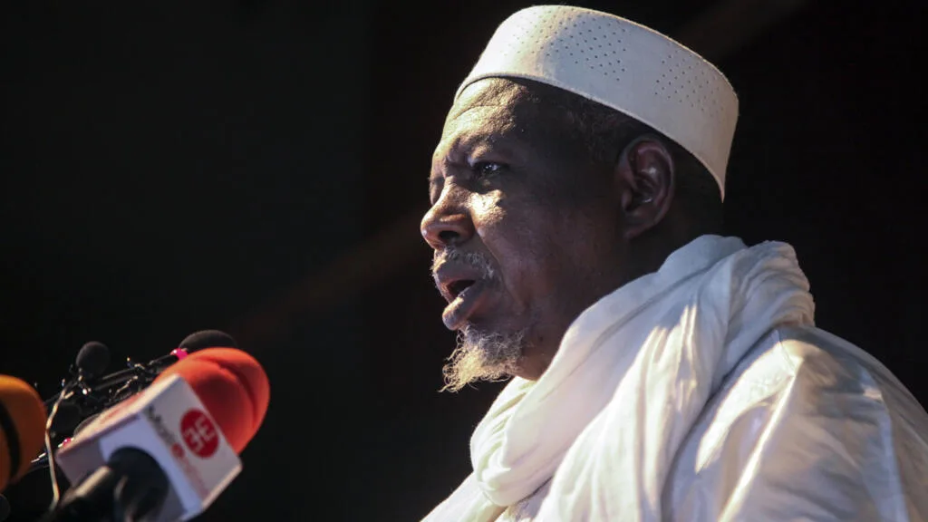 former malian official speaking at a press conference