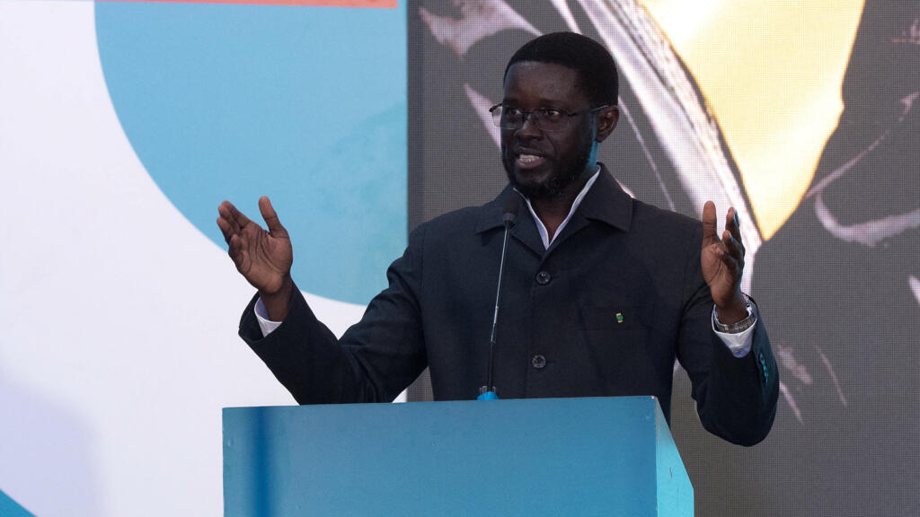 Senegalese President Bassirou Diomaye Faye gestures as he addresses the public during the launch ceremony of 'Kiiraay,' his new party, at the King Fahd hotel in the Almadies district of Dakar, on July 25, 2026.