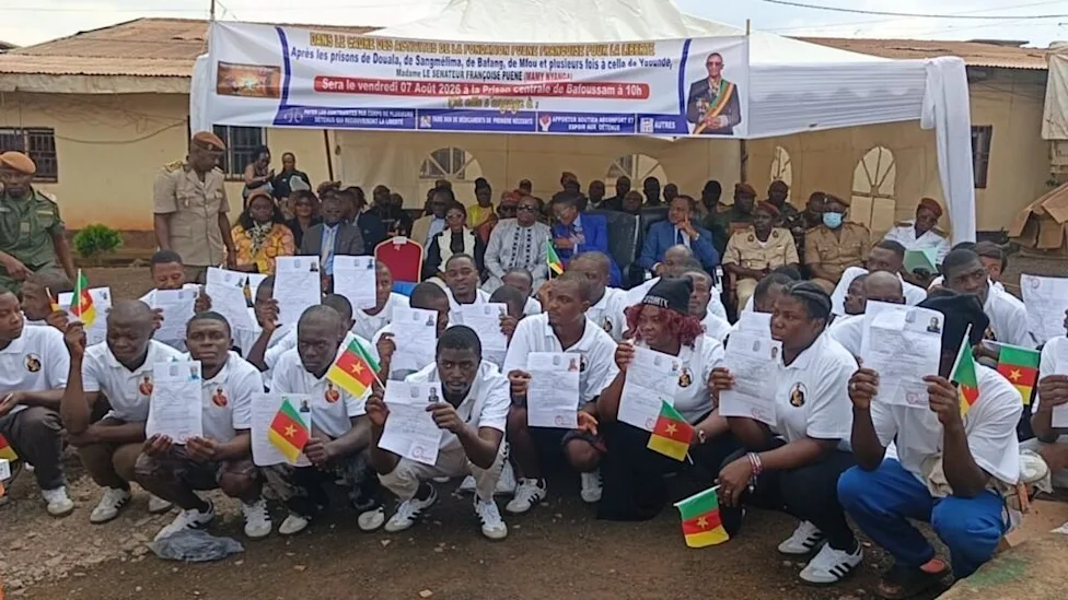Group of former inmates embracing after their release in Cameroon
