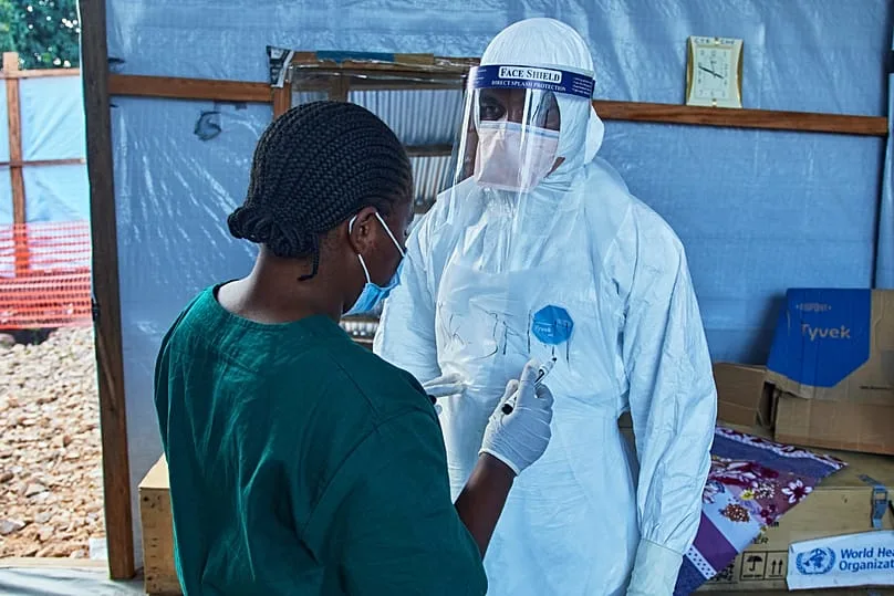 Health workers discuss patient care at Bunia’s Evangelical Medical Center on July 3, 2026